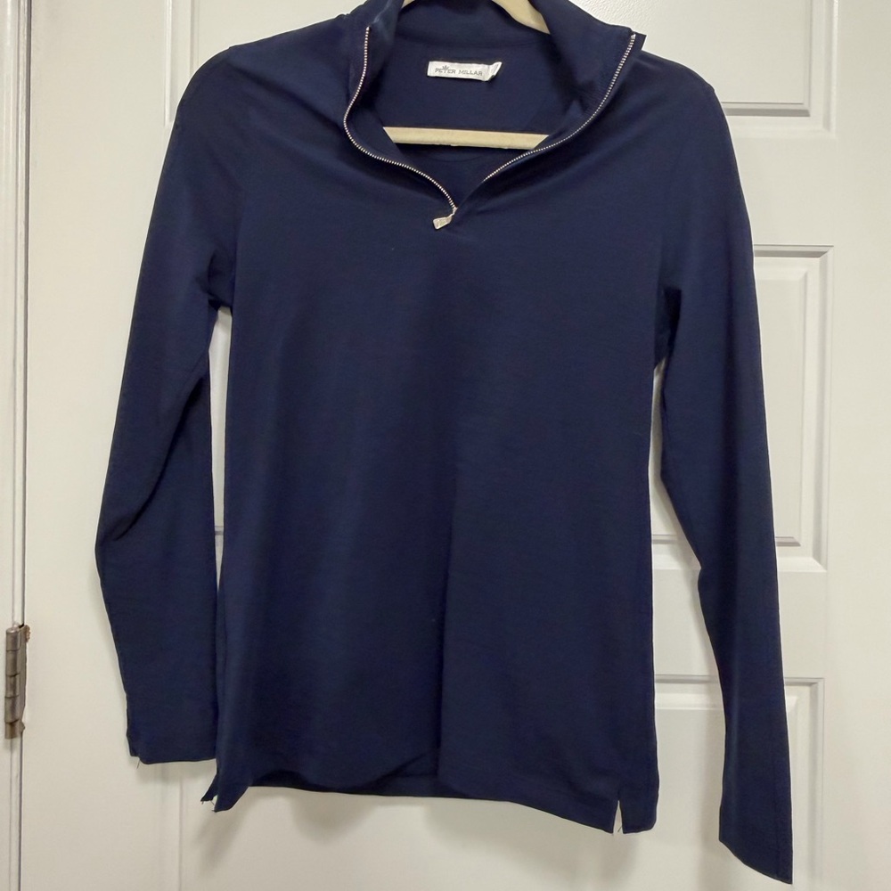 Peter Millar Navy Long Sleeve Top with Team TaylorMade logo on sleeve